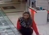Beautiful Girl cleverly stealing a mobile from a shop in Pakistan