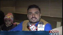 Multani enjoying eating ice cream in the cold