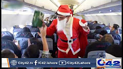 PIA do first time Santa claus greeting during flight